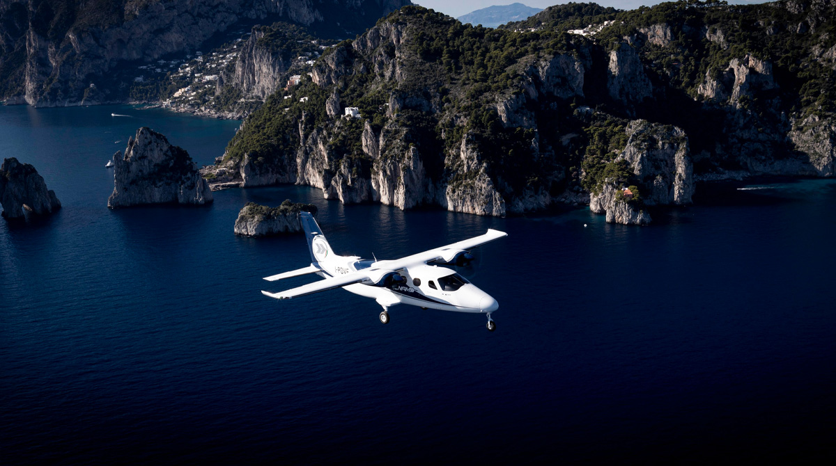 P2012 Traveller airline flying over Capri island